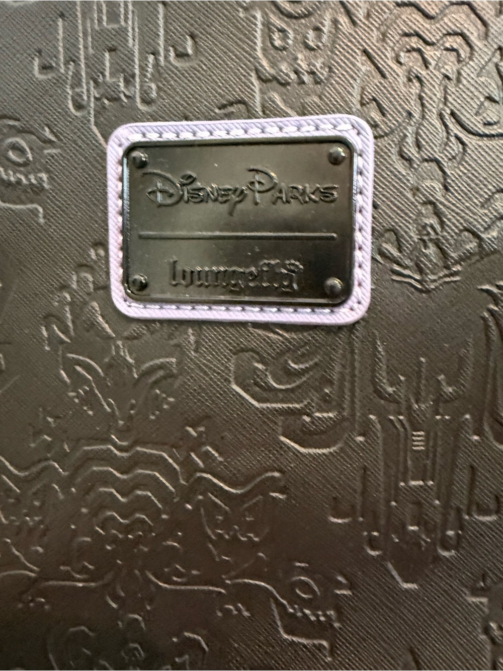 Disney Haunted Mansion Black Embossed Loungefly Backpack with Light Purple Trim